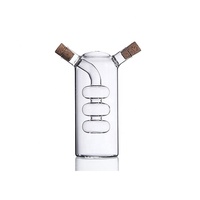 Petites bouteilles en verre de 250 ml pour huile avec poignée