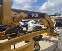 Niveleuse D'Occasion Caterpillar CAT 140H – Robuste et Puissante Niveleuse à Moteur Caterpillar 140H en Bon État