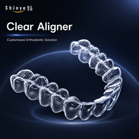 Dents de haute qualité accolades orthodontiques dents dentaires claires accolades en gros Portable Invisible aligneur dentaire adulte clair aligneur