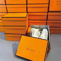Boîte cadeau pliable haut de gamme en carton ondulé pour chaussures, impression quadricolore, couleur personnalisée, carton écologique