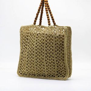 Bolso de playa de malla de ganchillo hueco para mujer, novedad de verano 2025, con asa de cuentas de madera - Product Image 2