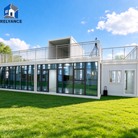 Maison conteneur RELYANCE avec auvent, fabricants de maisons conteneurs, mini-maisons modernes à 2 étages