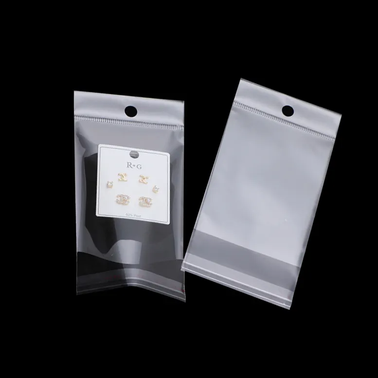 Small MOQ clear sleeve packaging clear watch plastic pouch clear white plastic bags for esrings