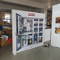 Mur d'affichage trois faces SEG pour stand d'exposition, avec fond graphique lumineux pour surveillance industrielle et marketing en salon professionnel