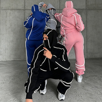 Ensemble de survêtement personnalisé OEM avec fermeture éclair, design tendance, passepoil cousu, cagoule et pantalon de survêtement pour femme