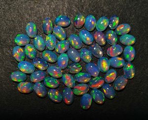 Lote de piedras preciosas sueltas de ópalo etíope natural hecho a mano de 8 piezas cabujón ovalado de corte facetado - Product Image 5