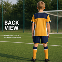 Tenue de football personnalisée pour jeunes : Maillot à manches courtes et short à rayures verticales et blocs de couleur pour l'entraînement quotidien des équipes de football pour enfants