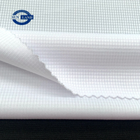 T-shirt de sport tricoté à la machine circulaire demi-brillant 100% polyester mini tissu gaufré