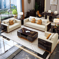 Ensemble de canapés en cuir véritable Furnistyle, style moderne, pour hôtels et villas, avec structure en acier inoxydable rose doré, design lounge, rembourrage en éponge