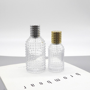 Botella de Perfume Redonda de Vidrio de Lujo de 100 ml con Diseño de Lunares y Clip, Botella de Spray Cosmético Vacía - Product Image 3