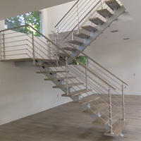 Escalier droit moderne et minimaliste en acier inoxydable pour villa, design durable à monopoutre