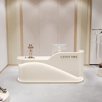 Comptoir de réception moderne en forme de L pour petit hôtel Taille de réception en marbre de carrare blanc Comptoir de réception