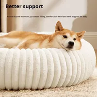 Lit rond pour animaux de compagnie luxueux, chaud, doux et confortable avec un motif solide pour chiens et chats