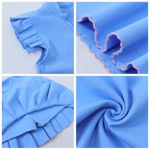 طقم يوجا مخصص للفتيات من تياوس، صندوق مفاجآت يحتوي على توب بدون أكمام بأكتاف مجنحة وتنورة مطوية مع تطريز - Product Image 4