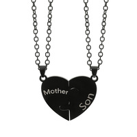 Collier tendance en acier inoxydable noir et blanc avec pendentif en forme de cœur et lettre anglaise