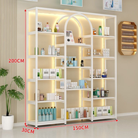 Promotion : Présentoir cosmétique doré pour salon et magasin, avec armoire intégrée, personnalisable (logo et dimensions)