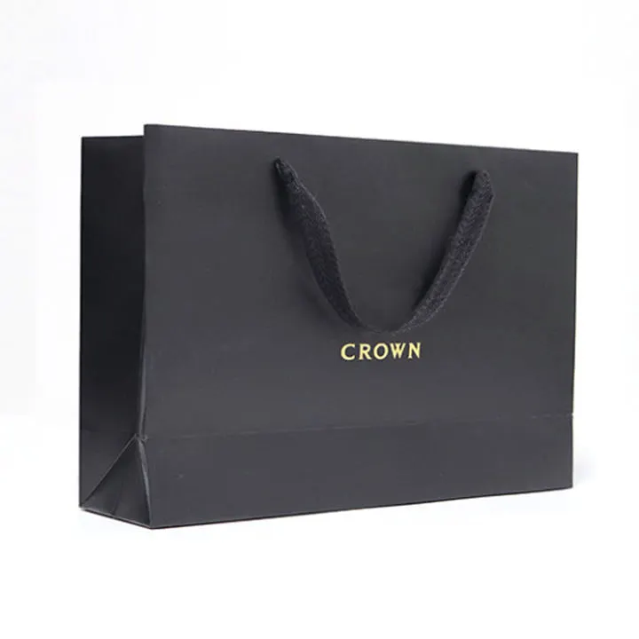 Vente en gros de logos de marque imprimés sur mesure vêtements de luxe cadeau shopping noir bijoux sac en papier avec logo