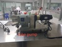 Machine d'emballage rotative pour sachets préformés de lessive liquide et de détergent, machine de remplissage de sachets à bec verseur