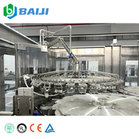 Ligne de production entièrement automatique de pasteurisation, d'embouteillage, de remplissage et de bouchage de jus de fruits en bouteilles PET