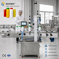 Machine de vissage et de capsulage verticale à deux étages BANMO avec plaque de pression pneumatique pour le pré-encastrement des têtes de pompe