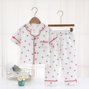 Vente directe usine de pyjamas pour enfants, ensembles en gaze à manches courtes, col à boutonnage simple, imprimé dessin animé, pyjamas pour filles. - Product Image 1