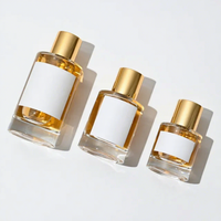 Pulvérisateur de parfum rond en verre rechargeable à brume fine avec capuchon doré 30ml/50ml/100ml OEM/ODM pour emballage de parfum