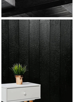 Revêtement extérieur moderne en bois carbonisé, façade brûlée, panneau mural extérieur en bois