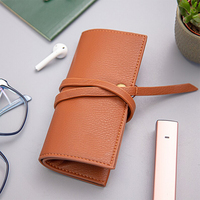 Sac de voyage multifonctionnel en cuir PU personnalisé avec rouleau de câble pochette d'emballage stocker tous vos câbles USB stylos écouteurs et chargeurs