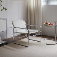 Fauteuil de lecture ergonomique moderne en cuir, avec structure en acier, confortable pour salon, maison, hôtel, école