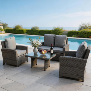 Ensemble de canapés de patio en osier 4 pièces pour l'extérieur avec coussins et table basse en verre - Product Image 1