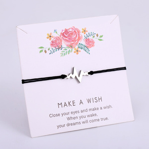 กำไลมือแพทย์พยาบาลโยคะรูปหัวใจโอมโอห์มทำจากสเตนเลสสตีล18K สีทอง Hamsa - Product Image 1