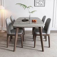 Ensemble table et chaises de salle à manger 4 places en marbre artificiel de style italien pour usage domestique ; design minimaliste pour espaces compacts ; table de salle à manger moderne