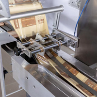 Ligne d'alimentation et de tri automatique 1 à 3 voies pour biscuits/gâteaux/pains, avec convoyeur haute vitesse et outil de recouvrement au chocolat disponible