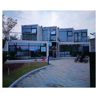 Maison modulaire préfabriquée à deux étages en conteneurs pour usage hôtelier, structure en acier, design moderne et écologique
