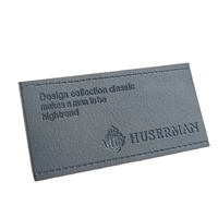 Étiquettes en similicuir avec logo en relief personnalisées en usine cousant des patchs en cuir en relief personnalisés pour vêtements Badges en cuir