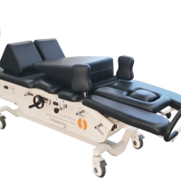 Lit de décompression de la colonne vertébrale réglable professionnel personnalisé en usine Table de traction cervicale Table de chute chiropratique électrique
