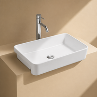 Lavabo semi-suspendu en céramique pour le lavage des mains, lavabo semi-encastré pour hôtels et usage domestique