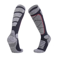 Vente en gros de chaussettes de ski unisexes tricotées d'hiver de haute qualité pour l'extérieur avec logo sur la manchette