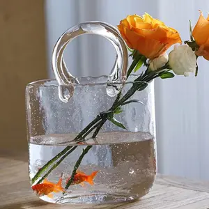 रचनात्मक पारदर्शी ज्यामितीय ग्लास हैंडबैग आकार फूलदान सरल घर की सजावट
