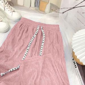 I-0524 Nuevos pantalones largos de primavera para mujer, de seda helada, ecológicos, impermeables, de cintura media, corte holgado, estilo bota, formales - Product Image 6