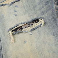 Celana Pria dan Wanita Gaya High Street Trendy Motif Leopard Patchwork Desain Distressed Jeans Streetwear Pria Model Longgar