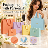 Sacs en papier d'art imprimés en couleur, prêts à la vente, pour les chaînes de magasins d'optique et de vêtements, avec personnalisation de marque et approvisionnement en gros