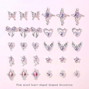 Vente en gros de plusieurs styles de breloques de décoration d'<span class=keywords><strong>ongles</strong></span> en strass <span class=keywords><strong>pour</strong></span> les décorations de <span class=keywords><strong>faux</strong></span> <span class=keywords><strong>ongles</strong></span> en cristal avec nœud papillon 3d et cœur - Product Image 5