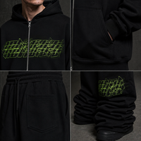 Ensemble survêtement homme personnalisé avec logo imprimé sérigraphié, sweat à capuche entièrement zippé noir et pantalon de survêtement évasé