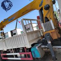 Camion-grue HOWO TX7 6X4 neuf, grue de 12 tonnes, transmission manuelle 460 CV, faible kilométrage pour le marché africain