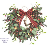 Décoration festive pour la maison : Couronne de Noël en feuilles d'eucalyptus avec baies et pommes de pin, à suspendre à la porte
