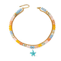 Collier ras du cou tendance pour femme avec pendentif étoile de mer en pierre naturelle et chaîne dorée colorée, idéal pour l'été et la plage