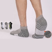 Vente à chaud de chaussettes rembourrées en éponge rembourrées épaisses pour hommes et femmes chaussettes de sport professionnelles avec logo personnalisé
