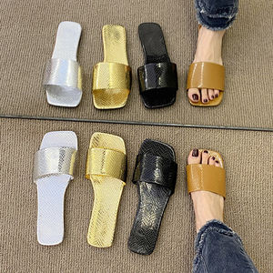 รองเท้าแตะผู้หญิงพื้นแบนรูปงูโลหะ HO - Product Image 1