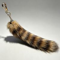 Direct usine Porte-clés et pendentif de sac en fausse queue de raton laveur 30 cm, duveteux, avec pompon et clip